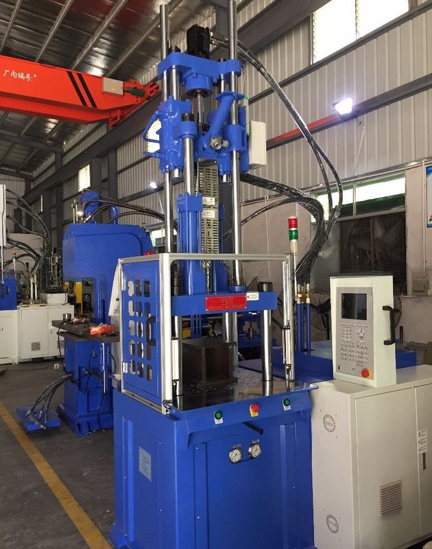 200MM Opening Stroke 55T Hydraulic Vertical Injection Molding Machine With 2 Working Table